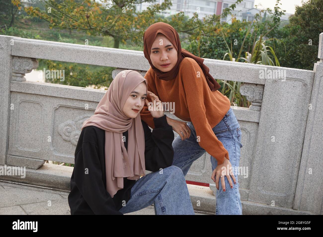Two beautiful moslem girls with a natural background. The girls ...
