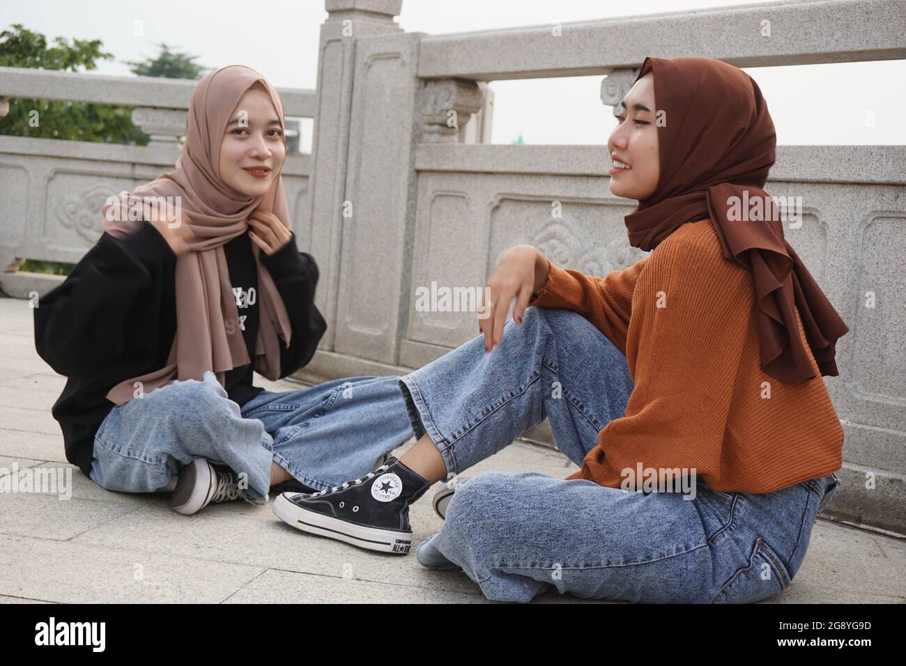Two beautiful moslem girls with a natural background. The girls ...