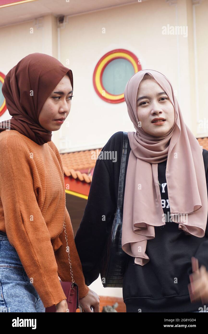 Two beautiful moslem girls with a natural background. The girls ...