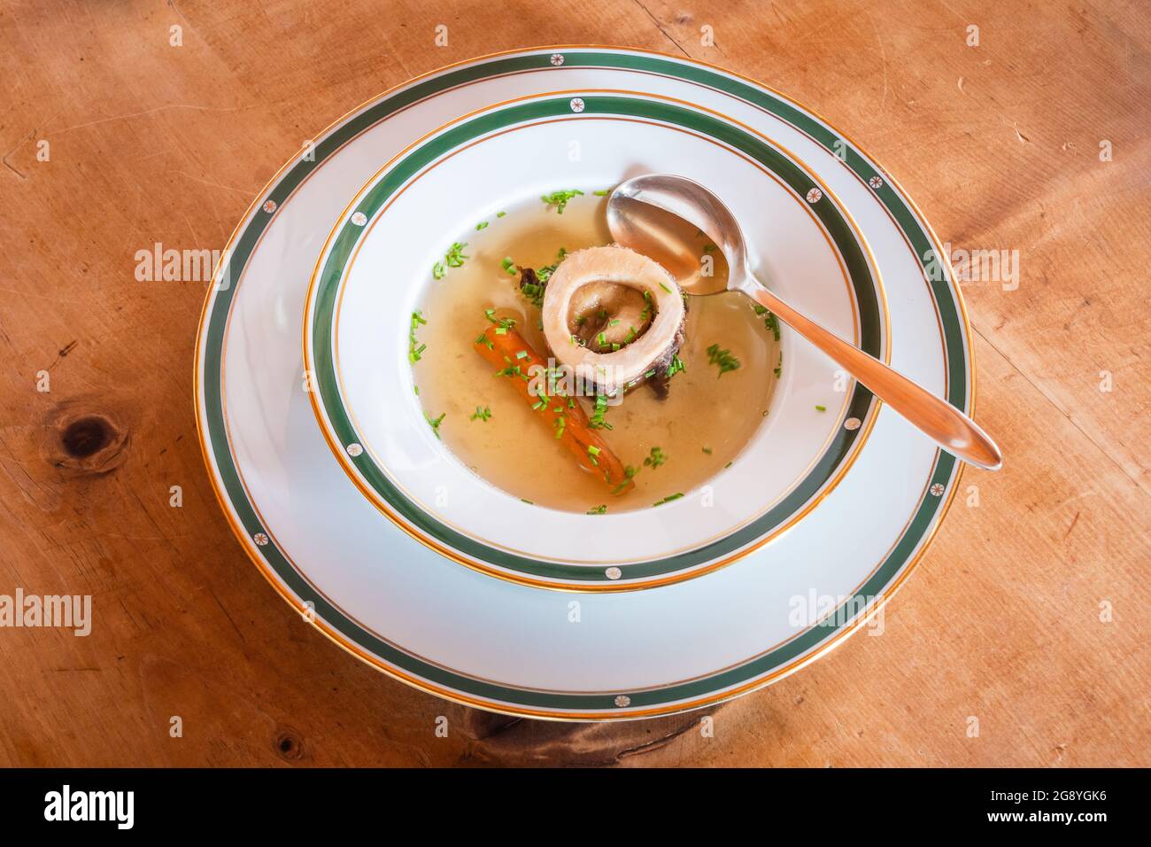 Beef Bouillon Soup with Marrow Bone, Carrot and Chives, an Austrian