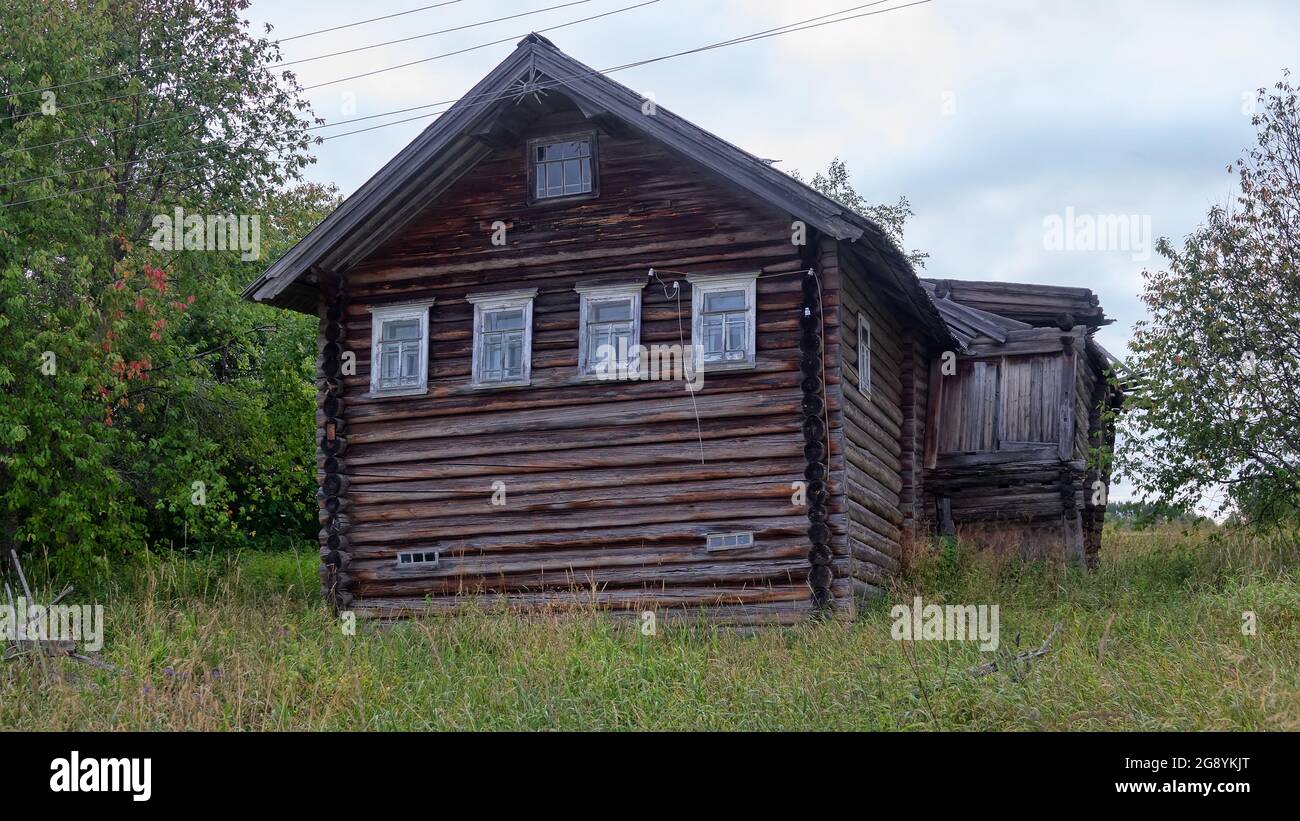 Old Russian wooden houses in the village and provincial town of Arkhangelsk near-polar regions Stock Photo