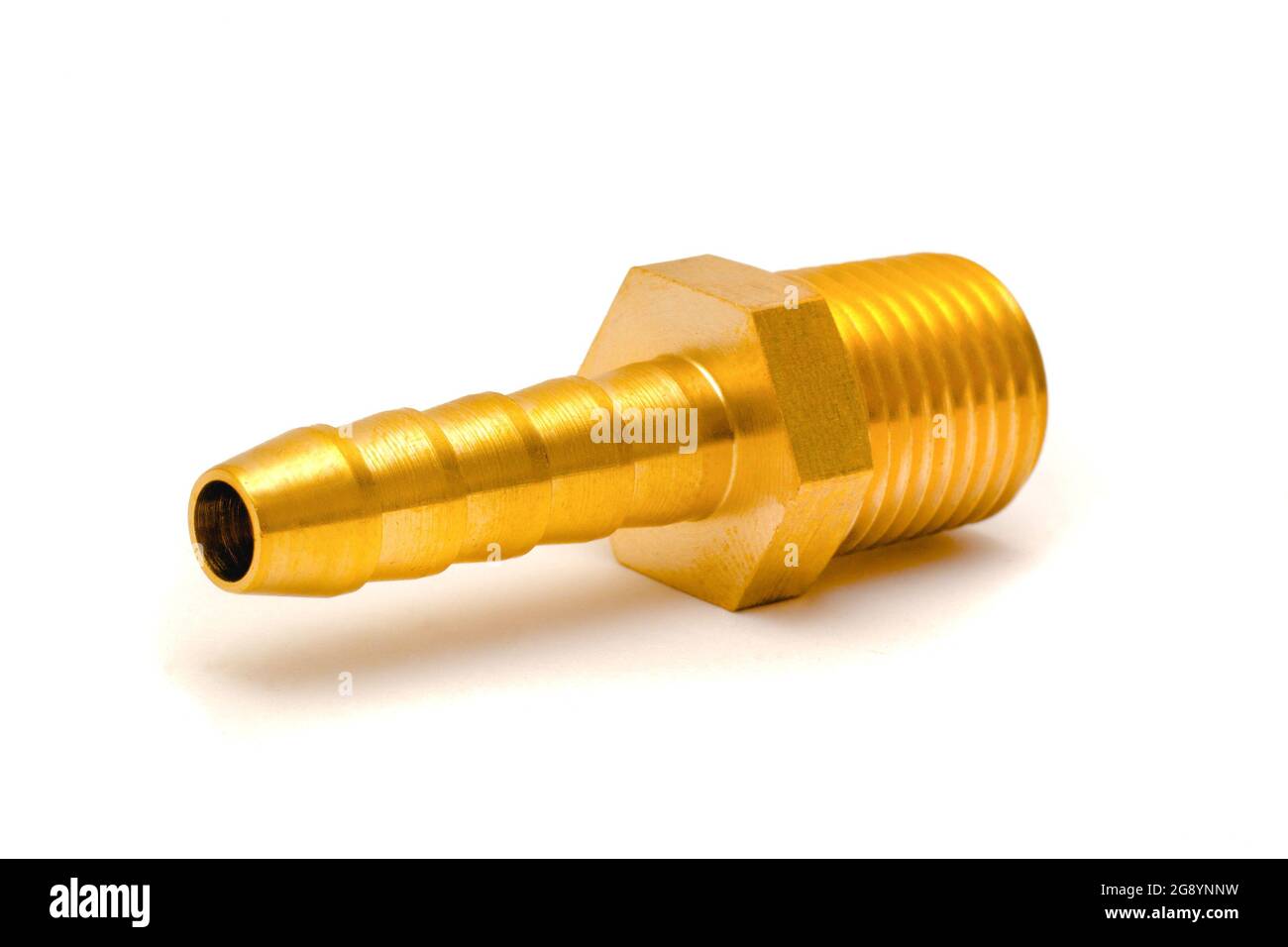 Threaded brass barb pipe fitting on white. Stock Photo