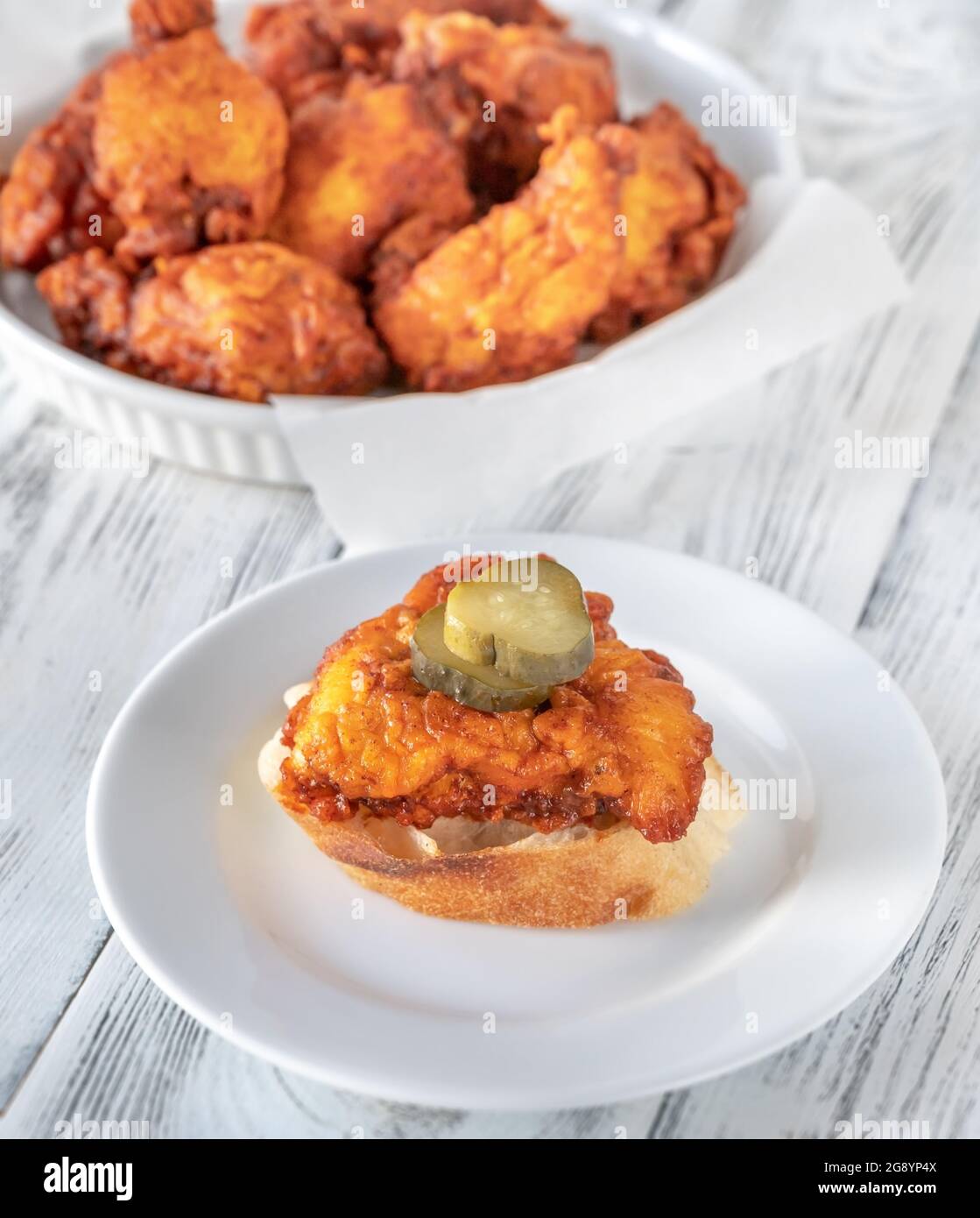 Nashville Hot Chicken covered in cayenne pepper sauce Stock Photo Alamy