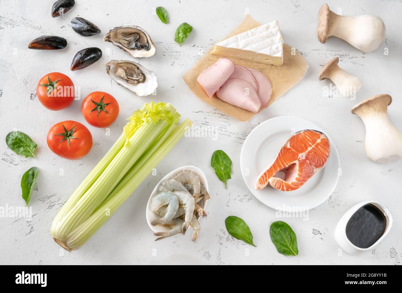 Assortment of Umami - rich foods on the white background Stock Photo