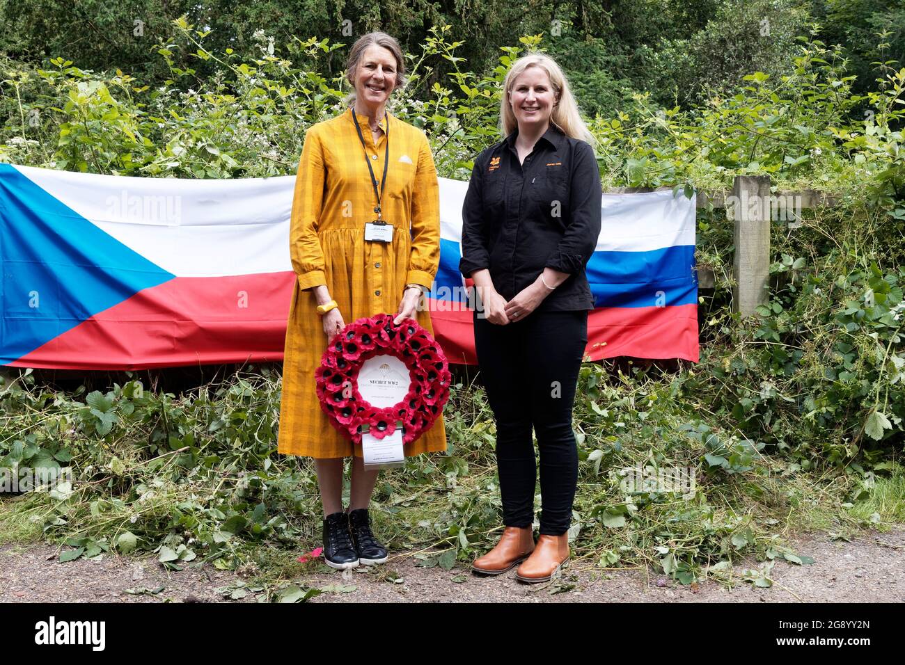 Louisa Russell, Chair of the Secret World War 2 Learning Network with wreath accompanied by Aly Holly representing the National Trust at the unveiling & commemorative service related to Bellasis & Operation Anthropoid Stock Photo
