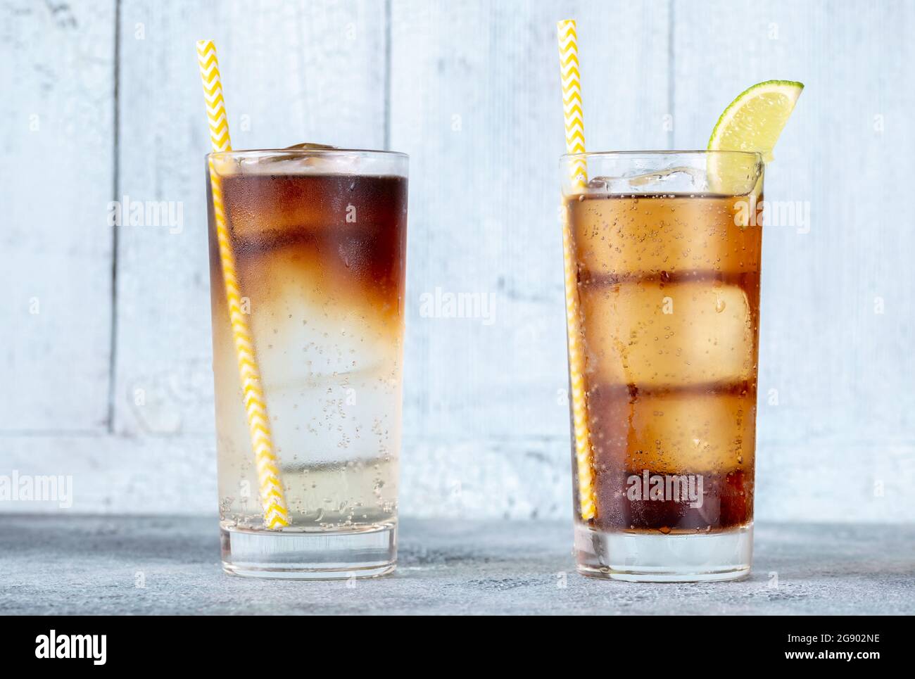 Glasses of Dark 'n' Stormy and Cuba libre cocktails Stock Photo