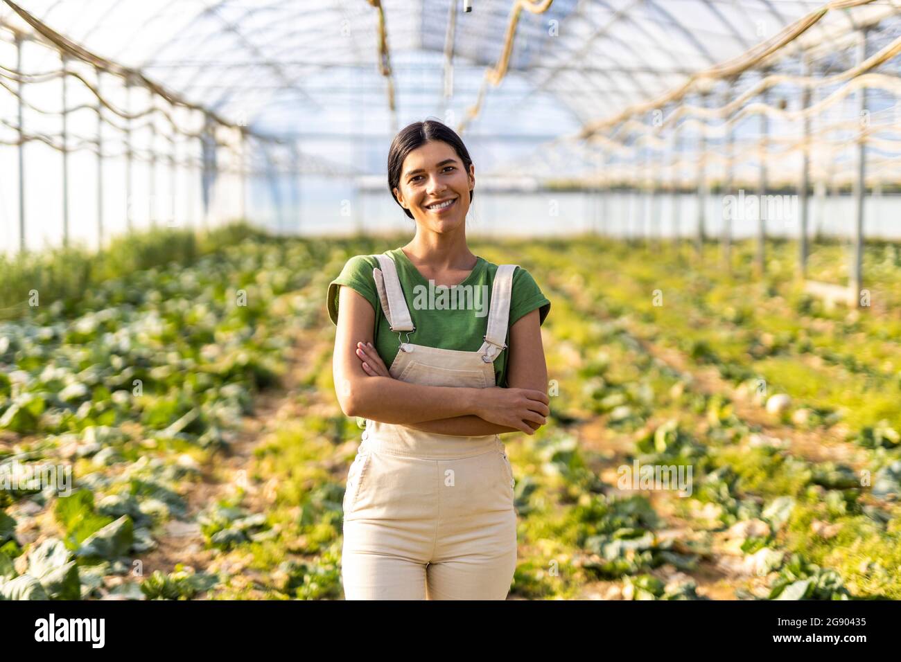 Female worker standing crossed hi-res stock photography and images - Alamy