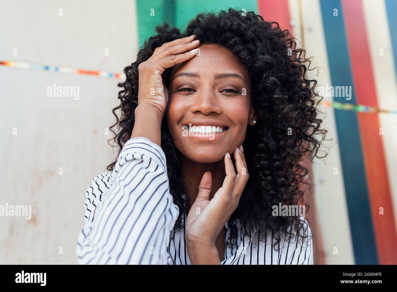 Smiling beautiful woman curly hi-res stock photography and images - Alamy