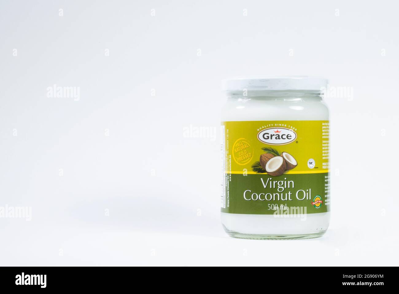 A container of Grace coconut oil isolated on a white background. Stock Photo