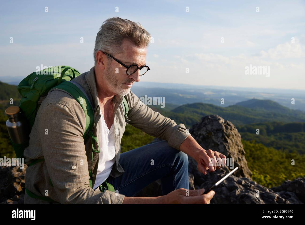 Male hiker using communication hi-res stock photography and images - Alamy
