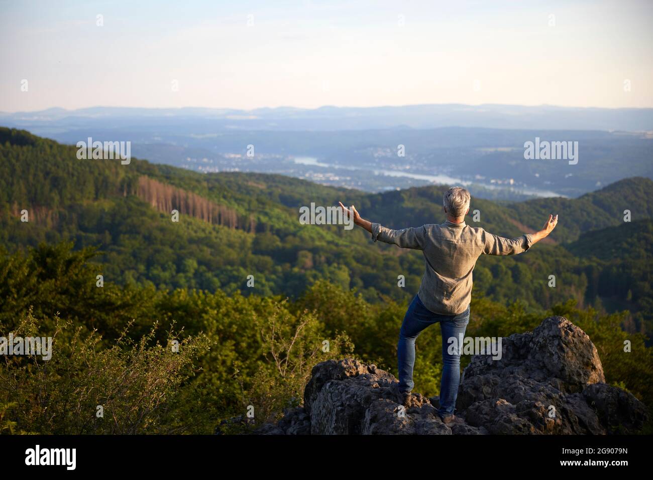 Hiker standing top mountain hi-res stock photography and images - Alamy