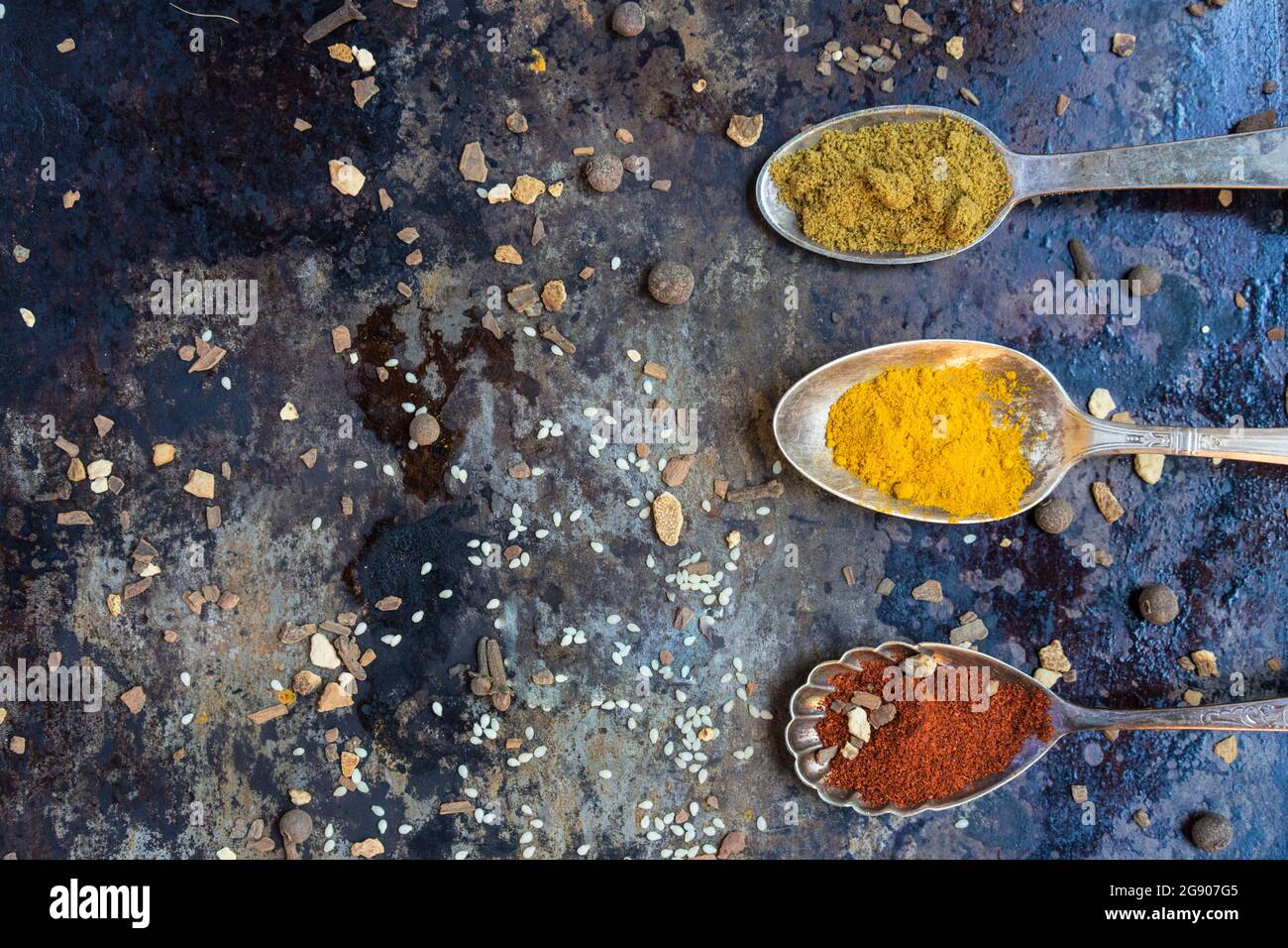 Spoons with various spices and legumes Stock Photo