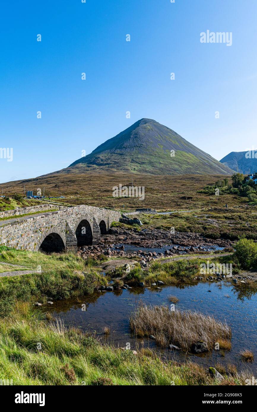 UK, Scotland, Sligachan, Sligachan Old Bridge with mountain in background Stock Photo