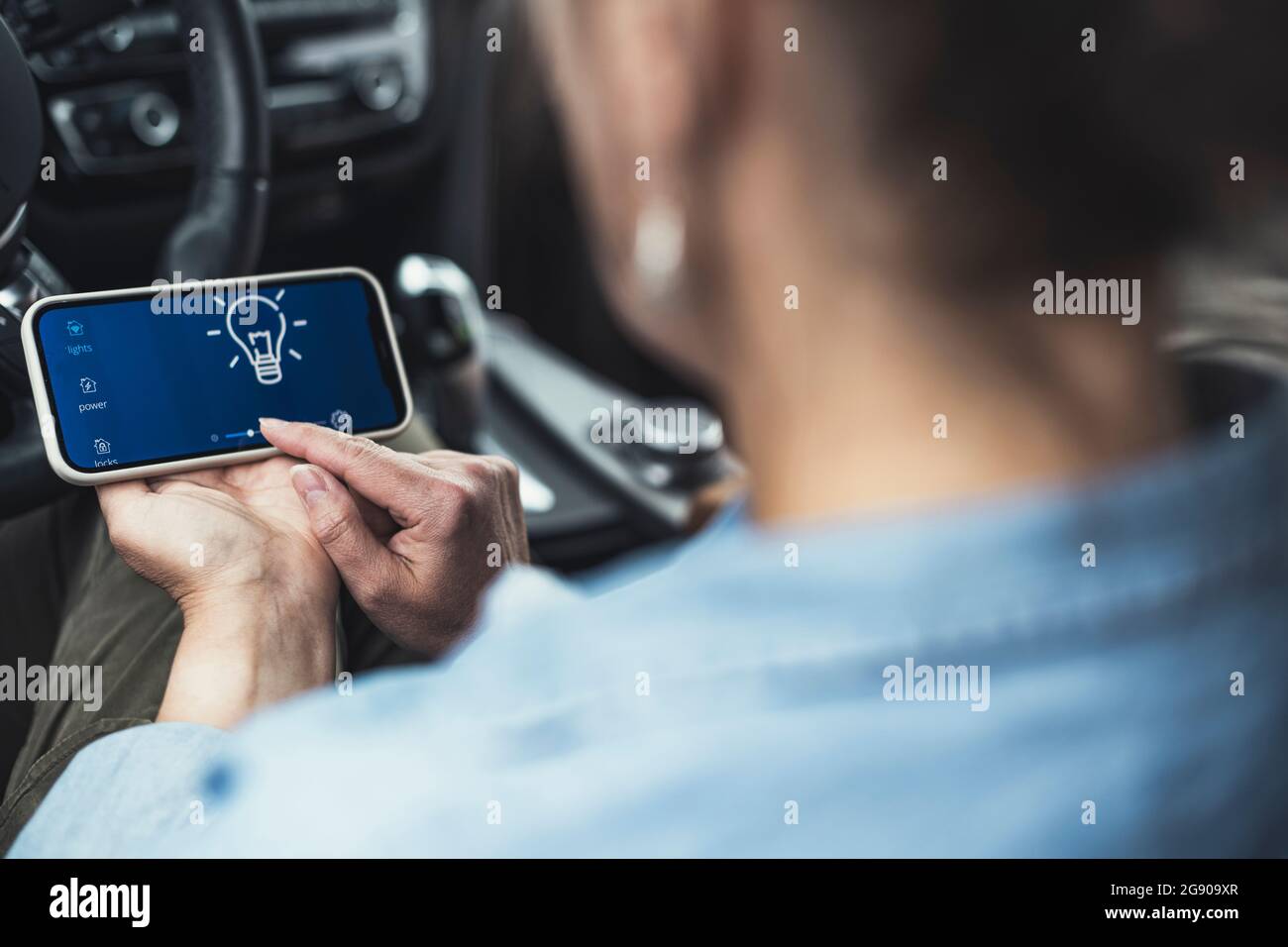 Female rear view mobile sitting hi-res stock photography and images - Alamy