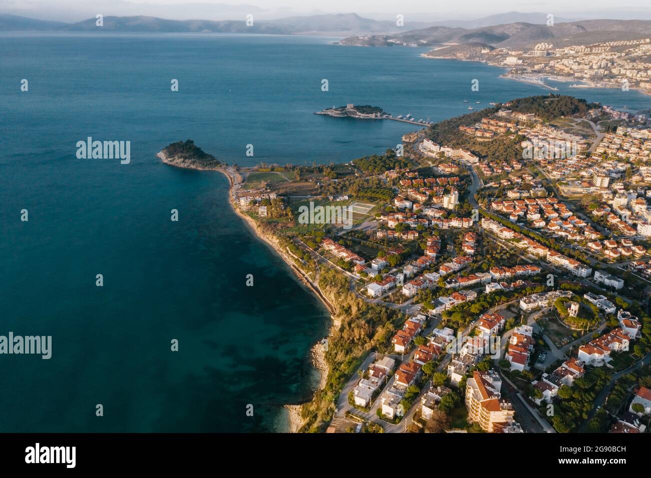 Turkey, Aydin Province, Kusadasi, Aerial view of coastal town in summer ...