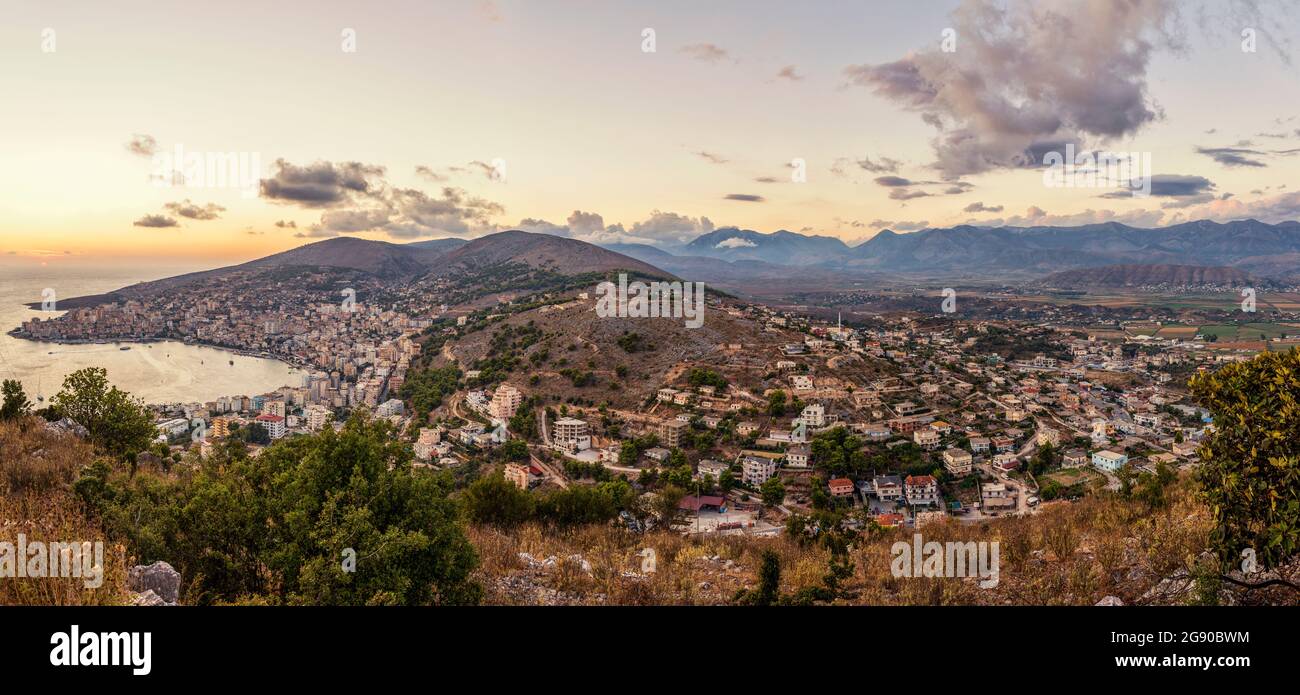 Albania, Vlore County, Sarande, City on Ionian coast at dusk Stock Photo