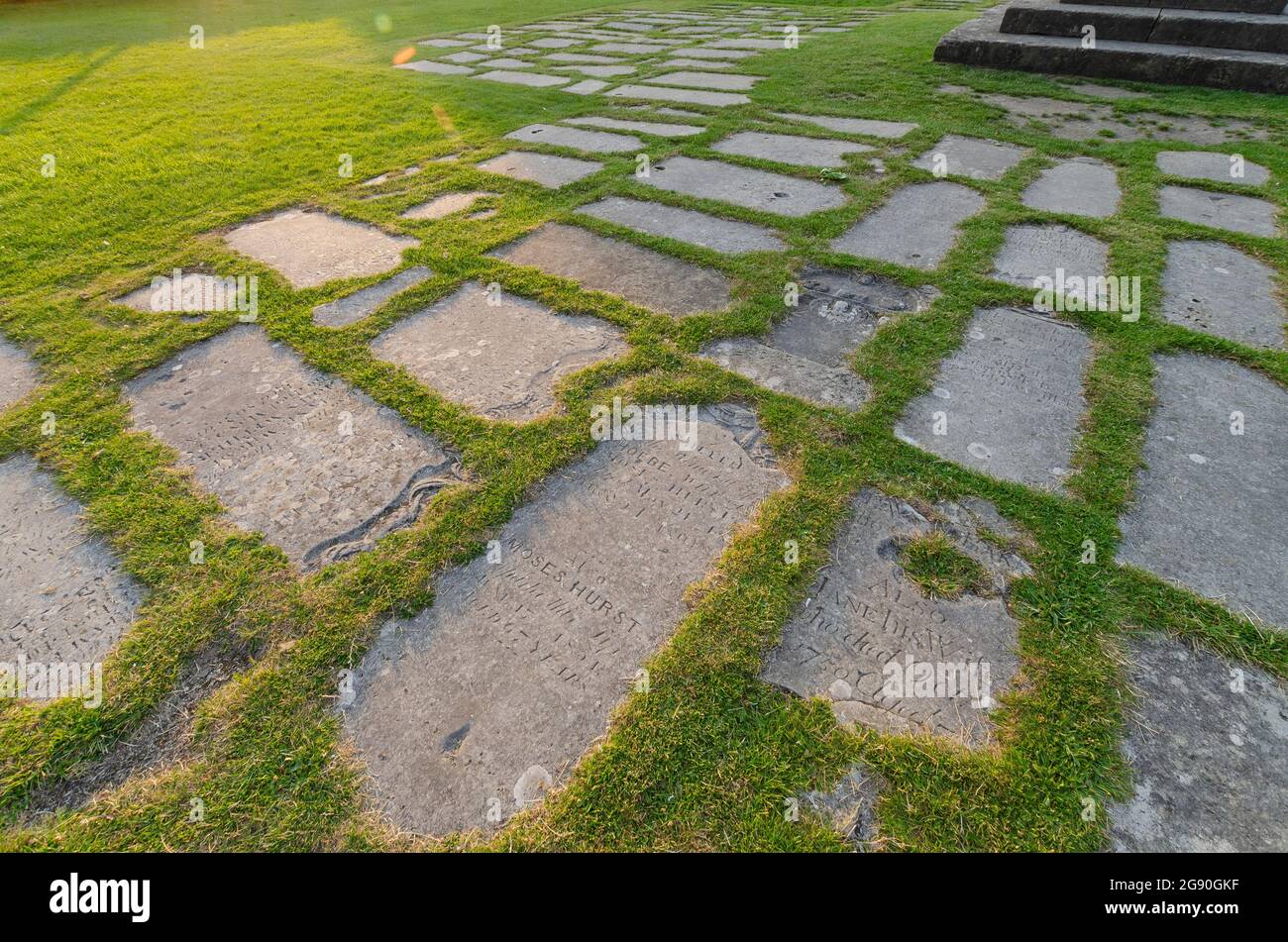 grave headstones laid in garden at Romsey abbey Stock Photo