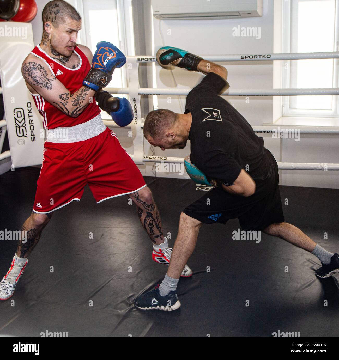 Two Ukrainian boxers square it off in the newly open boxing gym Versus, with the boxing popularity in the country rising and many new gyms opening Stock Photo