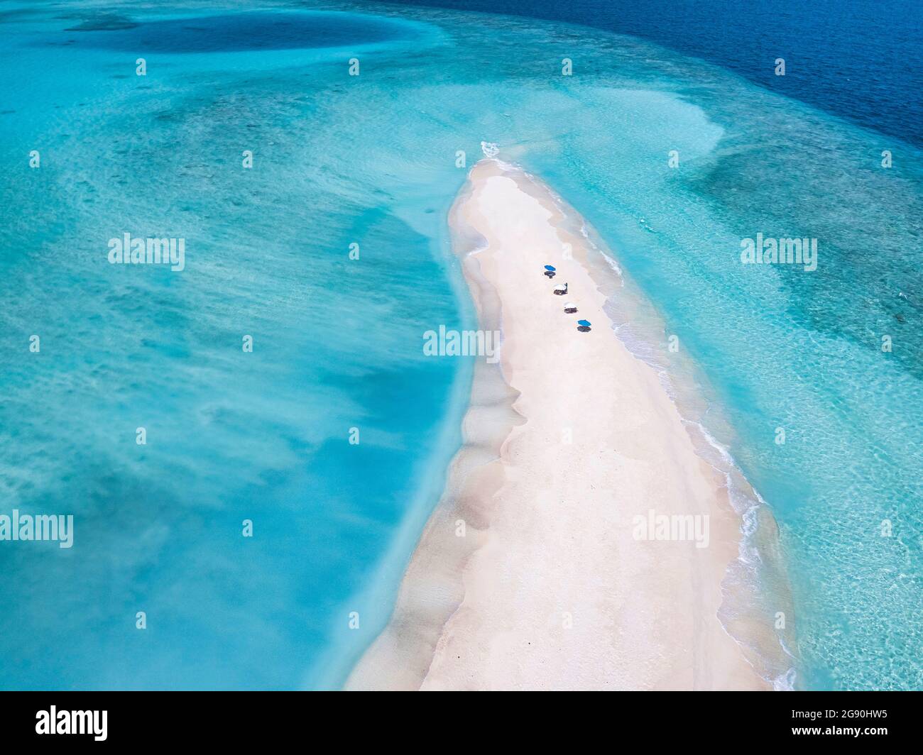 Maldives, Aerial view of small sandy islet off coast of Indian Ocean in summer Stock Photo