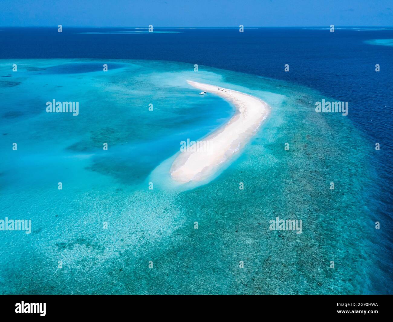 Maldives, Aerial view of small sandy islet off coast of Indian Ocean in summer Stock Photo