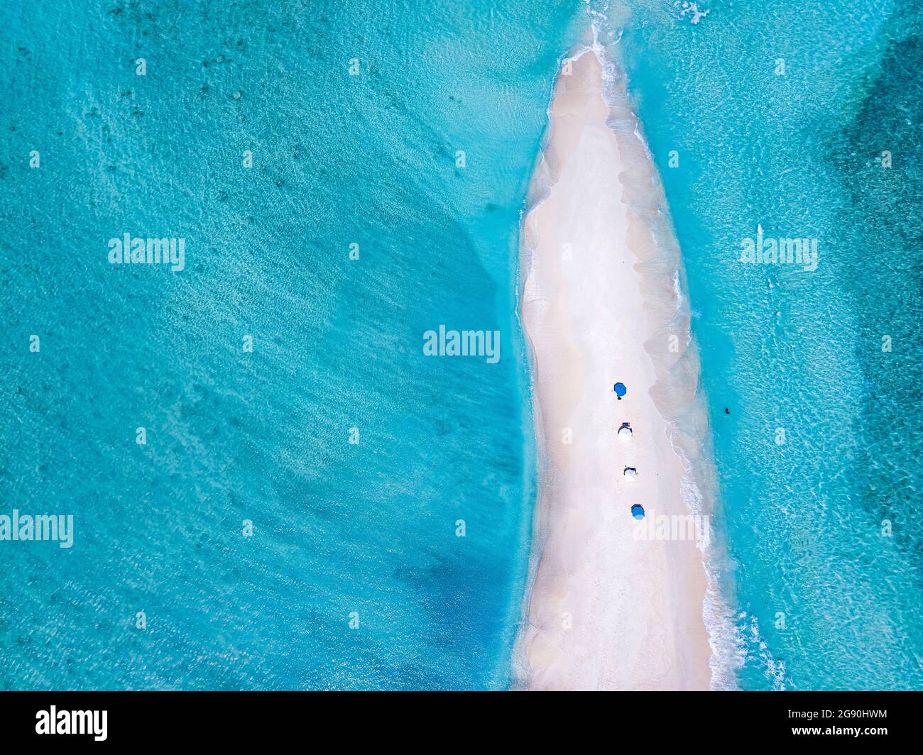 Sandy Islets Maldives, Aerial view of small sandy islet off coast of Indian Ocean in ...