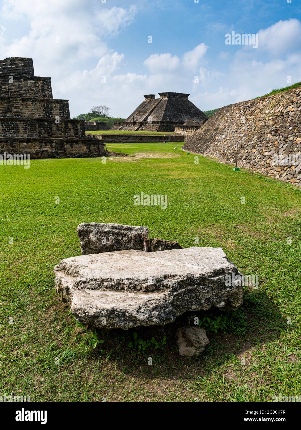 Rock on grass at El Tajin, Veracruz, Mexico Stock Photo