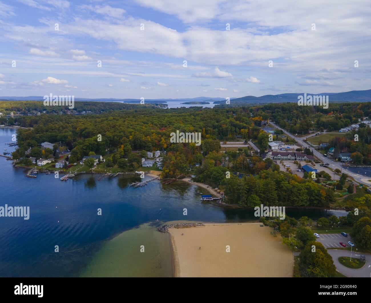 Lake Winnipesaukee and village of Weirs Beach aerial view with fall