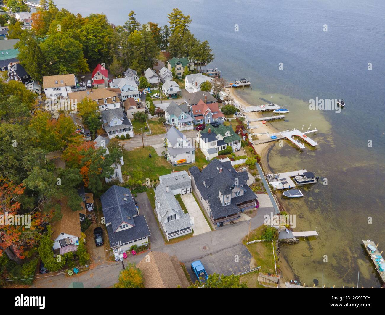 Lake Winnipesaukee and village of Weirs Beach aerial view with fall