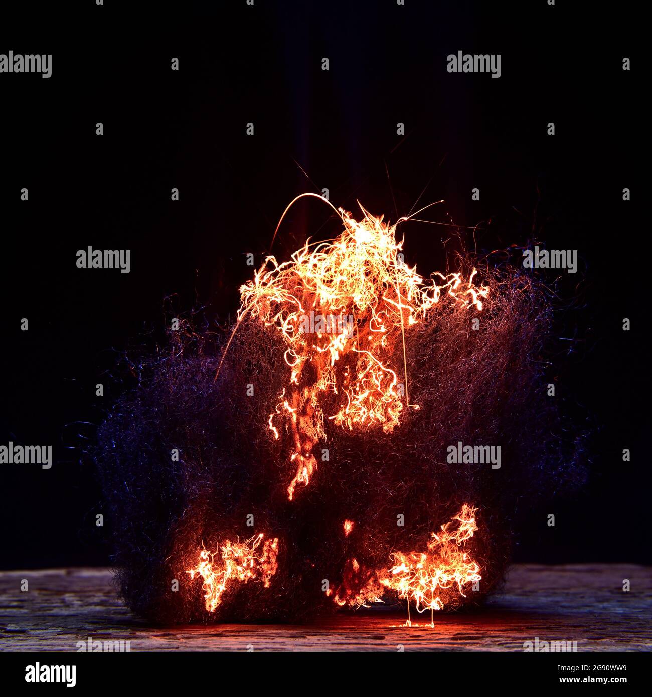 Sparkling steel wool on fire Stock Photo