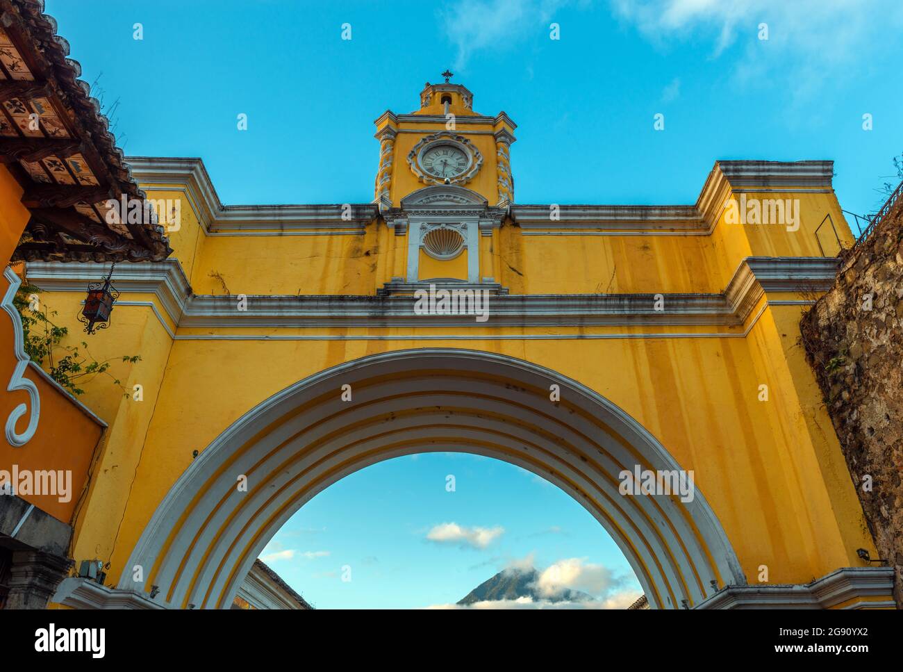 Santa Catalina Arch with Agua volcano before sunrise, Antigua, Guatemala. Stock Photo