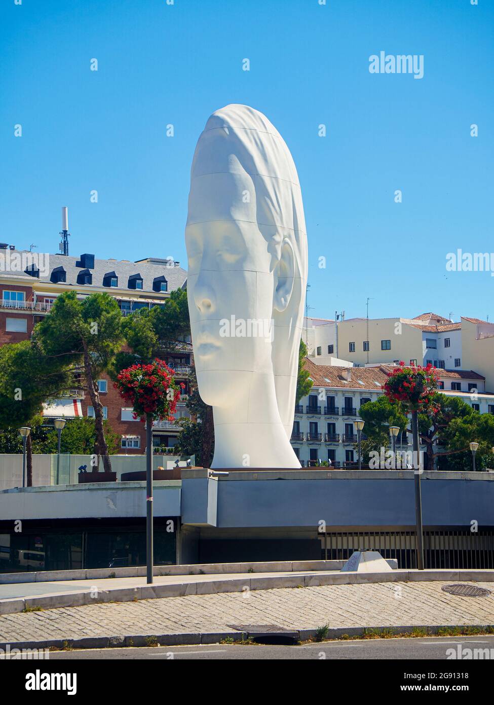 Julia, a sculpture by Jaume Plensa over the Centro Cultural de la Villa Theater (Fernan Gomez). Madrid, Spain. Stock Photo