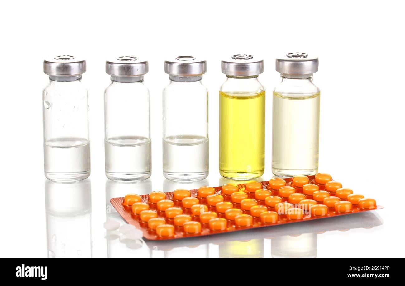 Tablets and ampoules isolated on white Stock Photo Alamy
