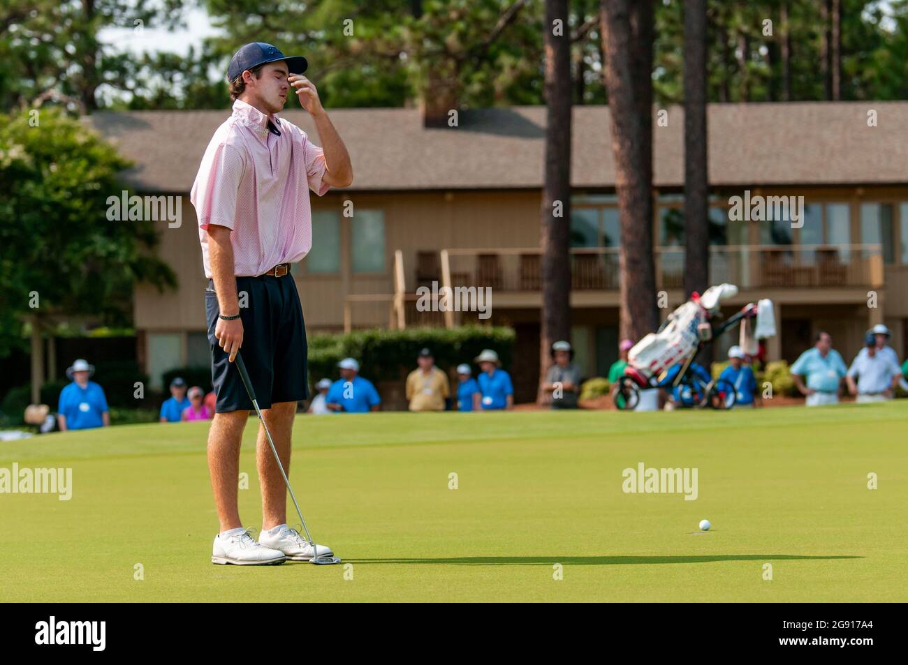 Pinehurst, North Carolina, USA. 23rd July, 2021. LUKE POTTER, of Encinitas, California, reacts after missing a putt on the 16th hole during the Semifinal at the 73rd U.S. Junior Amateur, July 23, 2021, at The Country Club of North CarolinaÃs Dogwood Course in the Village of Pinehurst, N.C. this yearÃs tournament saw the largest field ever with 264 players beginning stroke play on July 19. (Credit Image: © Timothy L. Hale/ZUMA Press Wire) Stock Photo