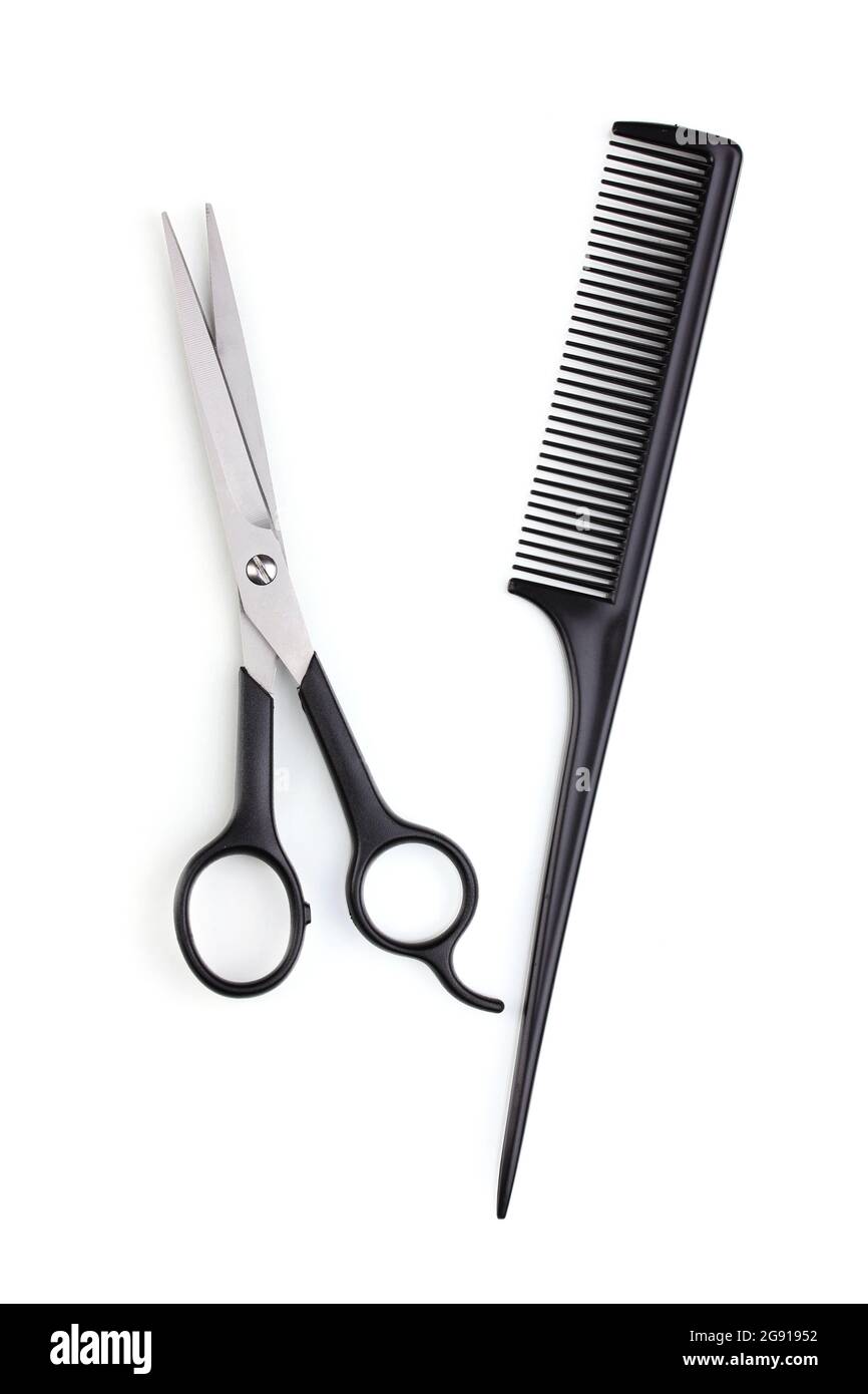 Hair cutting shears and comb isolated on white Stock Photo Alamy