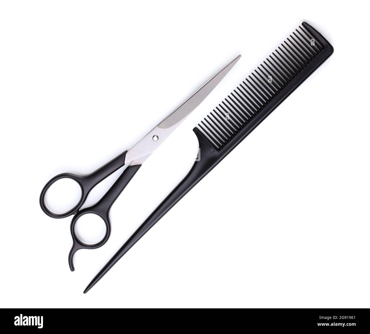 Hair cutting shears and comb isolated on white Stock Photo Alamy