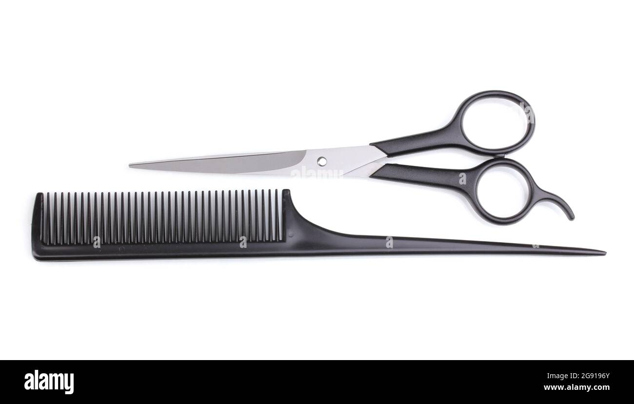 Hair cutting shears and comb isolated on white Stock Photo Alamy