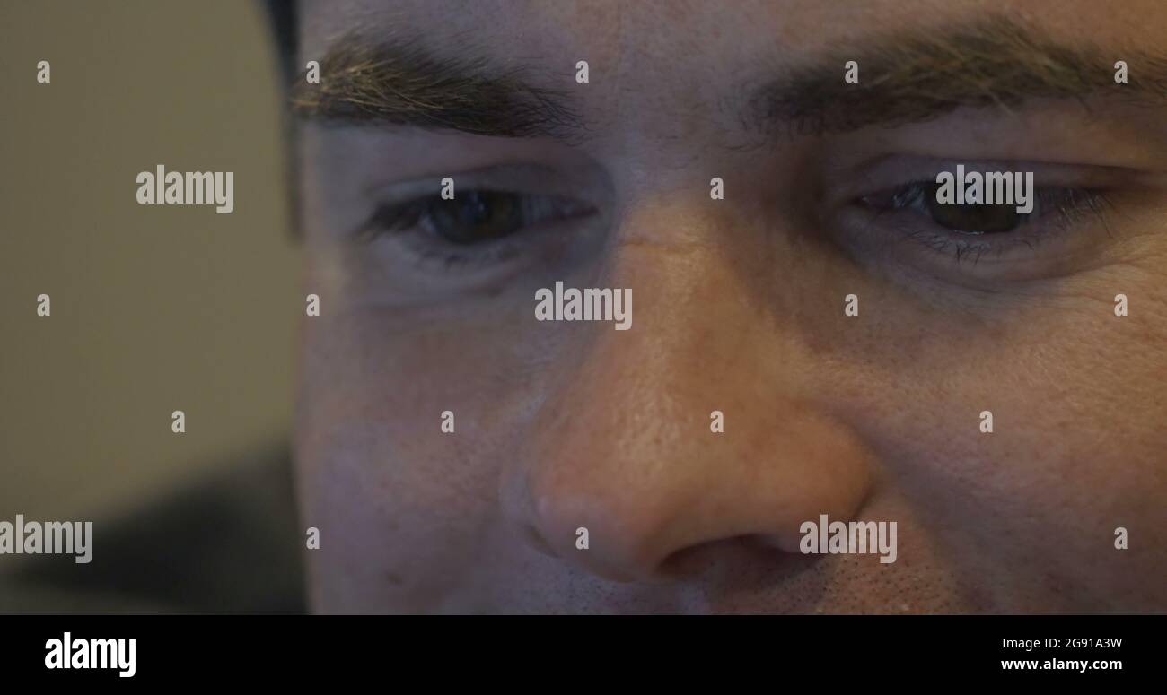 Young smiling man having a video call on cell phone Stock Photo