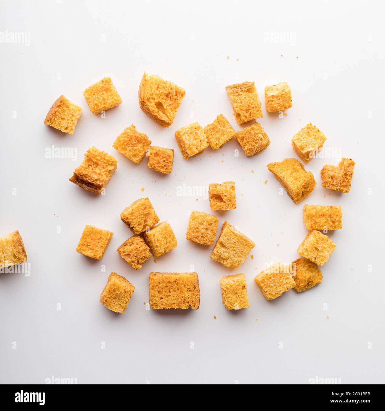 Square breadcrumbs. Ovenfried golden brown bread crumbs. White