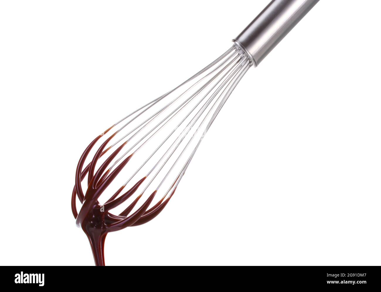 Metal whisk for whipping eggs with chocolate cream isolated on white