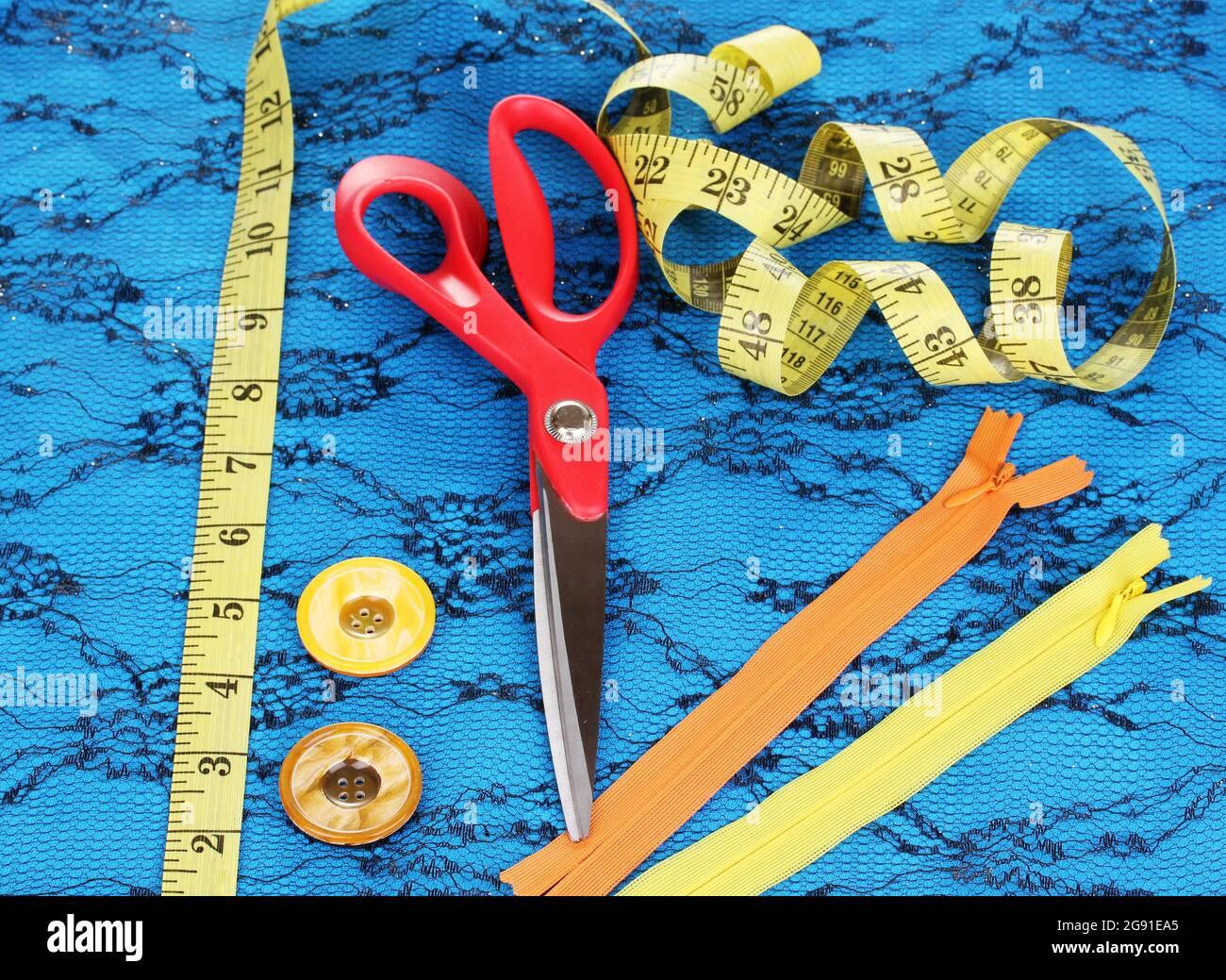 Sewing accessories on fabric Stock Photo Alamy