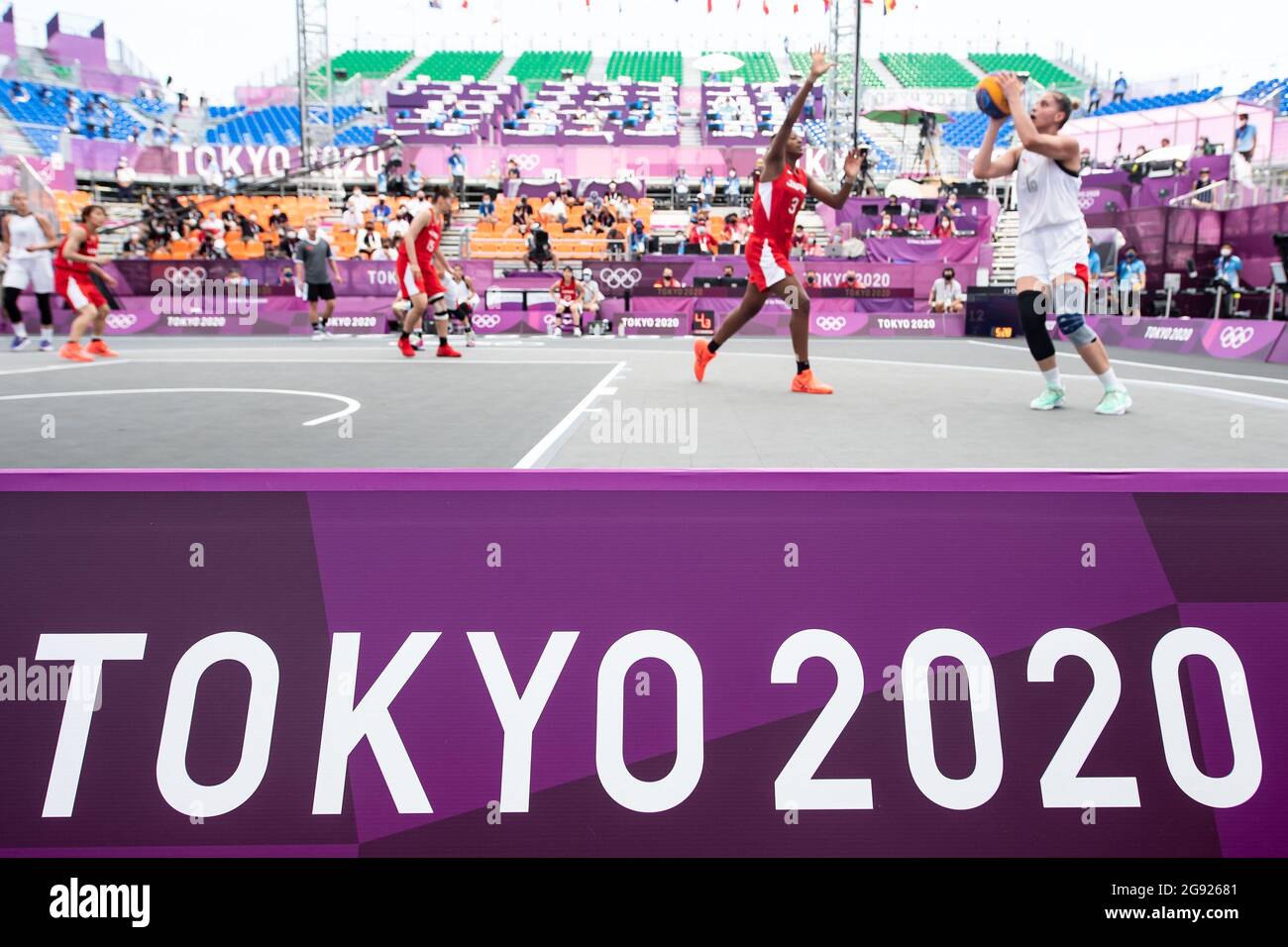Tokyo, Japan. 24th July, 2021. Football: Women's Olympics, Russian Olymp. Committee (ROC) - Japan, preliminary round, at Aomi Urban Sports Park. The TOKYO 2020 logo is seen in front of the players. Credit: Swen Pförtner/dpa/Alamy Live News Stock Photo