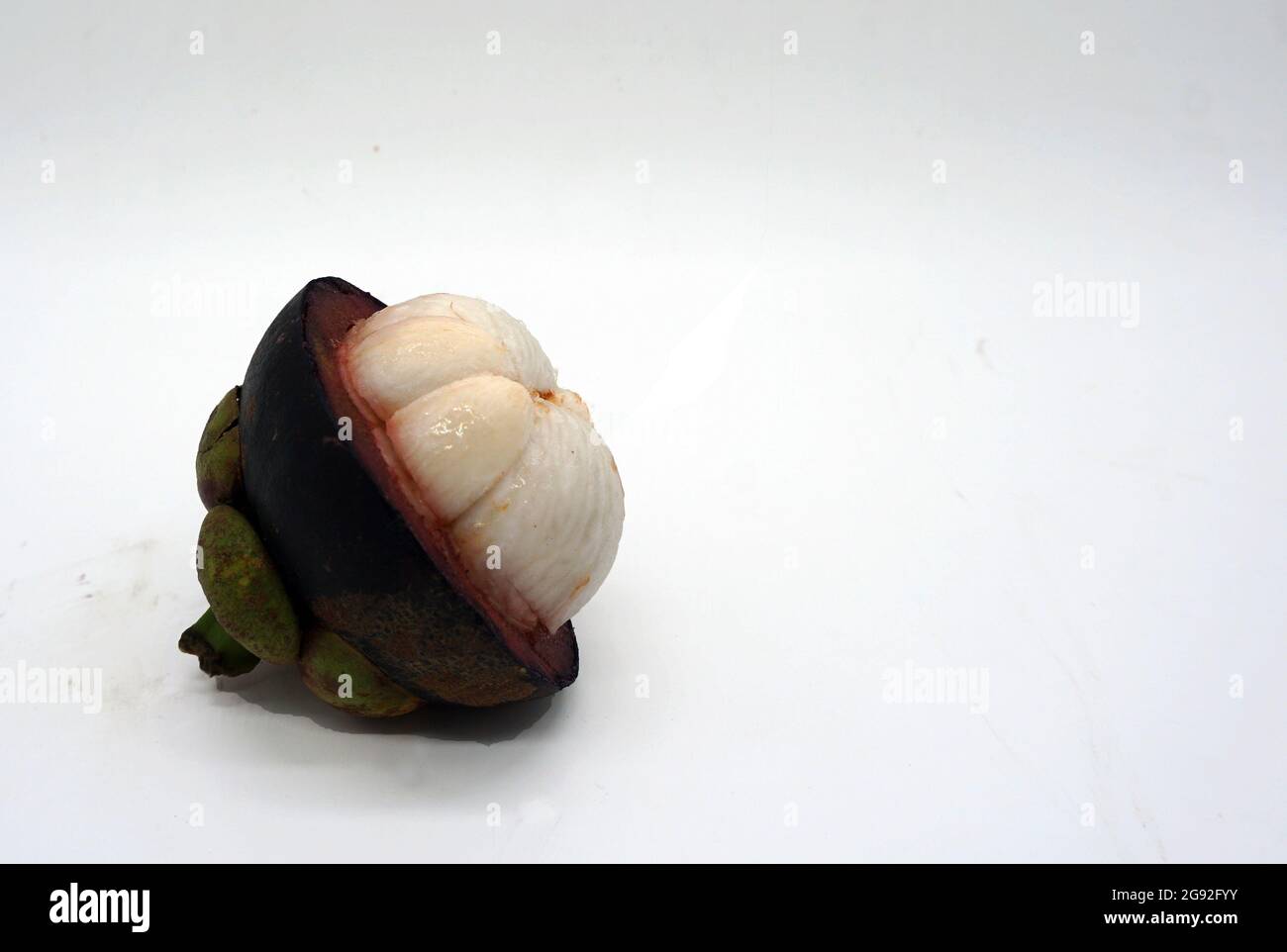 Mangosteen, ready to eat, is a fruit that is beneficial to health Stock Photo