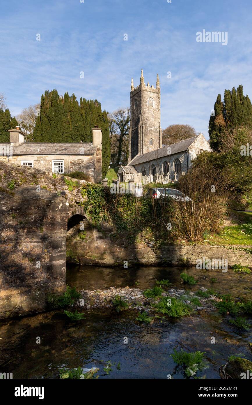 St Nonna's Church Altarnun, Cornwall overlooking river and old bridge Stock Photo