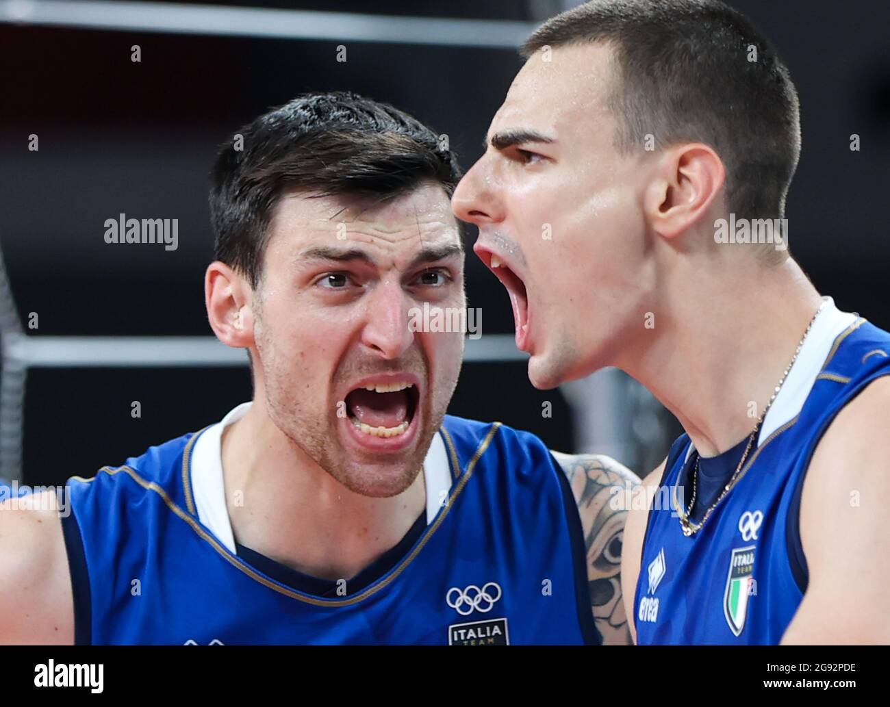 Dongjing. 24th July, 2021. Players of Italy celebrate scoring during the men's volleyball preliminary round match between Italy and Canada at Tokyo 2020 Olympic Games in Tokyo, July 24, 2021. Credit: Ding Ting/Xinhua/Alamy Live News Stock Photo