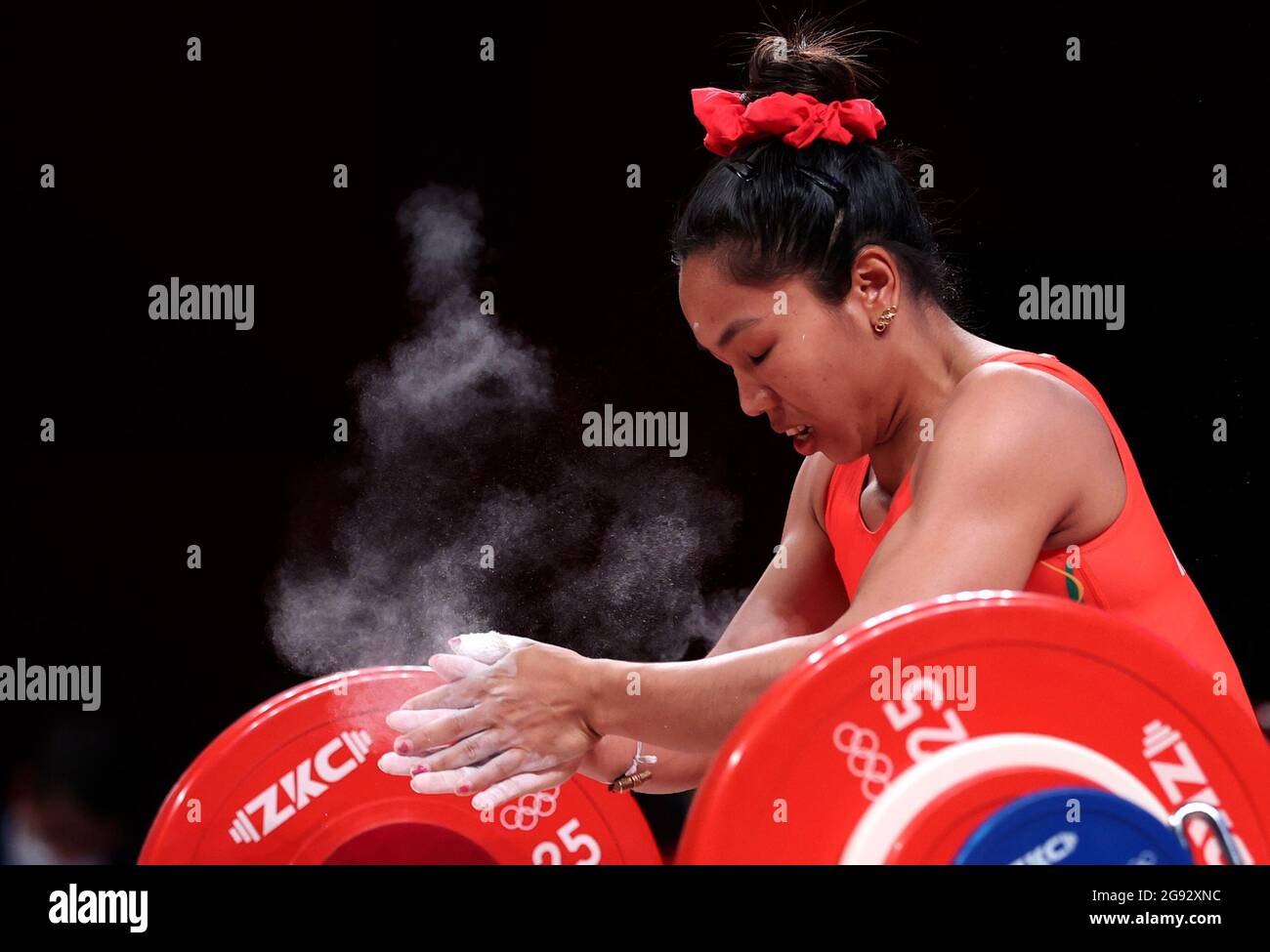 Tokyo, Japan. 24th July, 2021. Saikhom Chanu Mirabai of India competes during the women