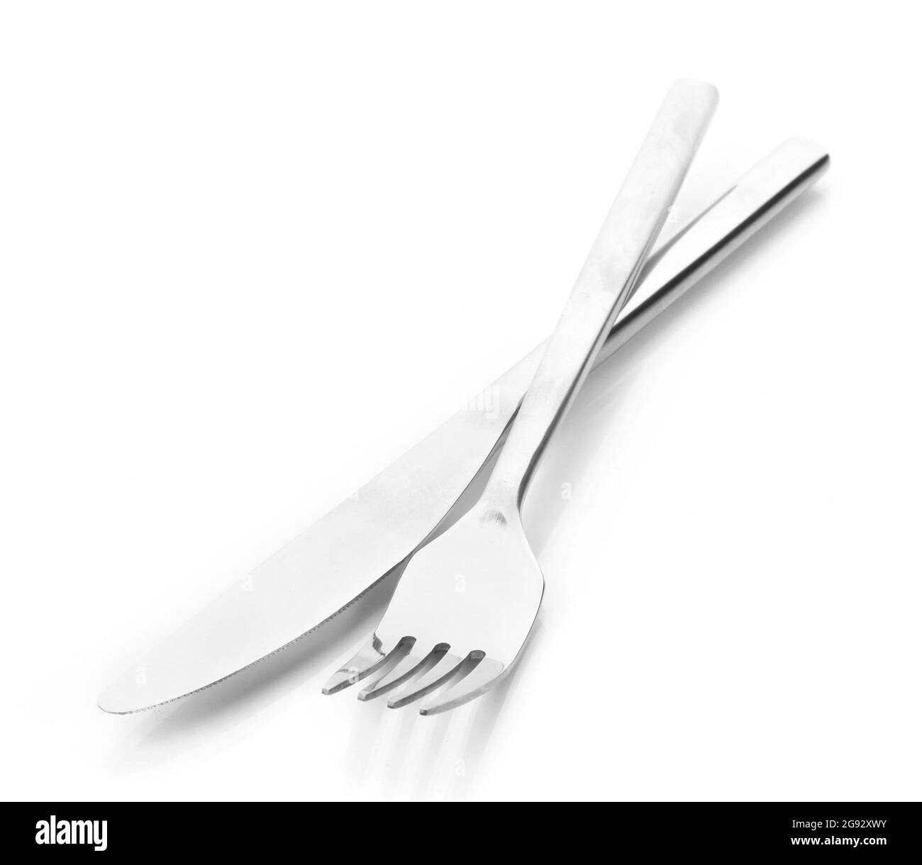 Silver fork and knife isolated on white Stock Photo Alamy