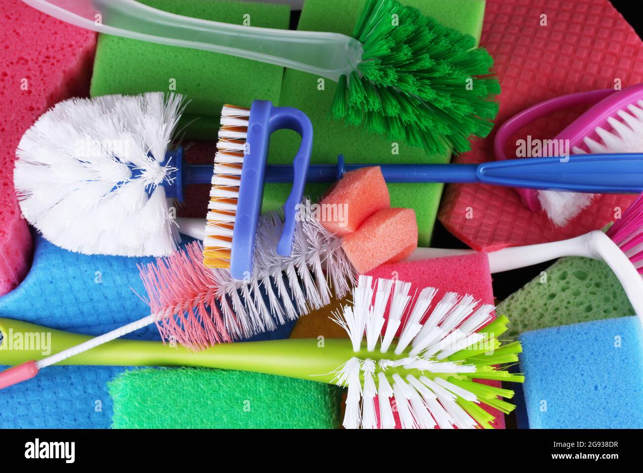 Many colorful sponges and brushes for housework Stock Photo Alamy