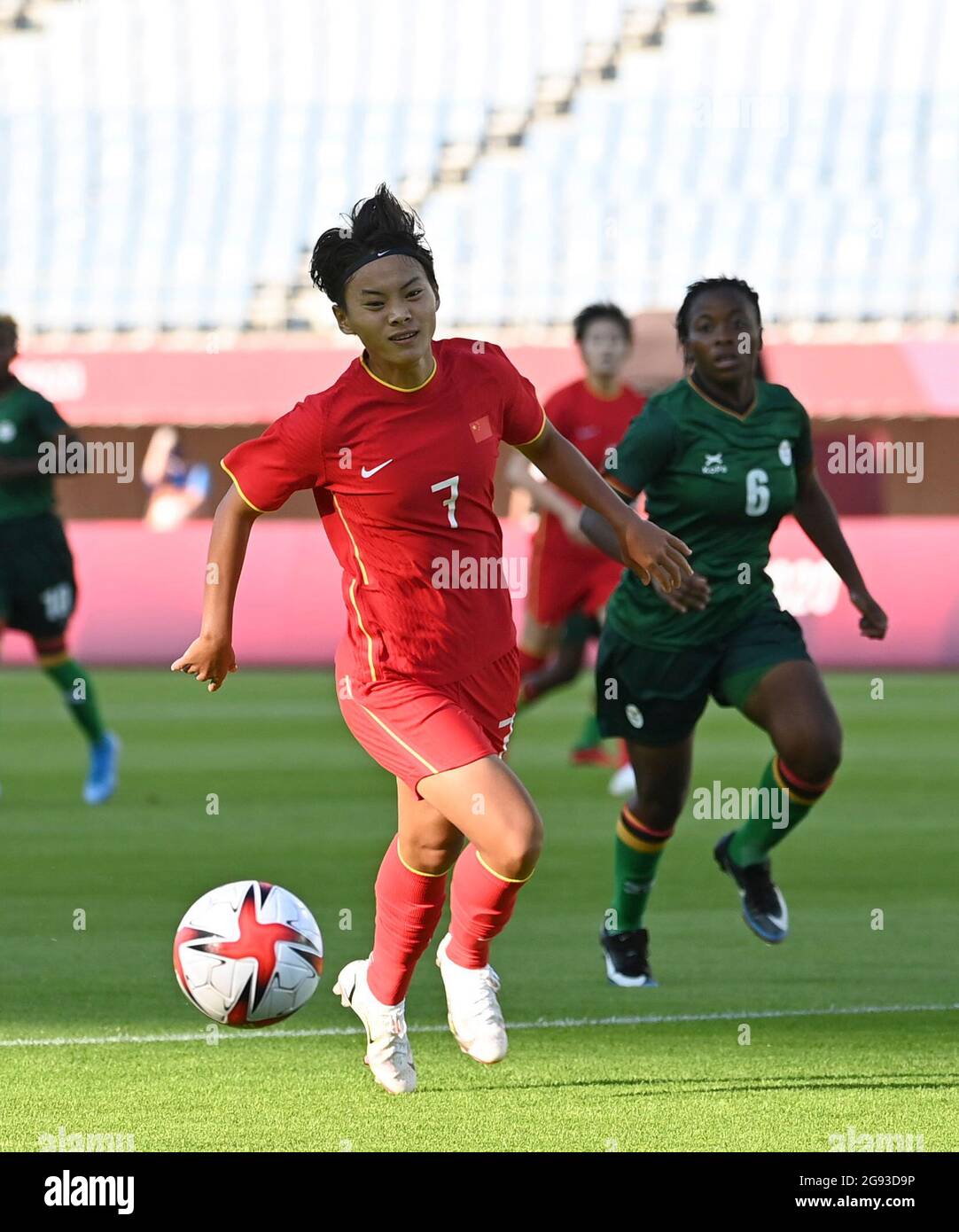 Miyagi, Japan. 24th July, 2021. Wang Shuang (front) of China competes during the Tokyo 2020 women's football group F match between China and Zambia in Miyagi, Japan, July 24, 2021. Credit: Lu Yang/Xinhua/Alamy Live News Stock Photo