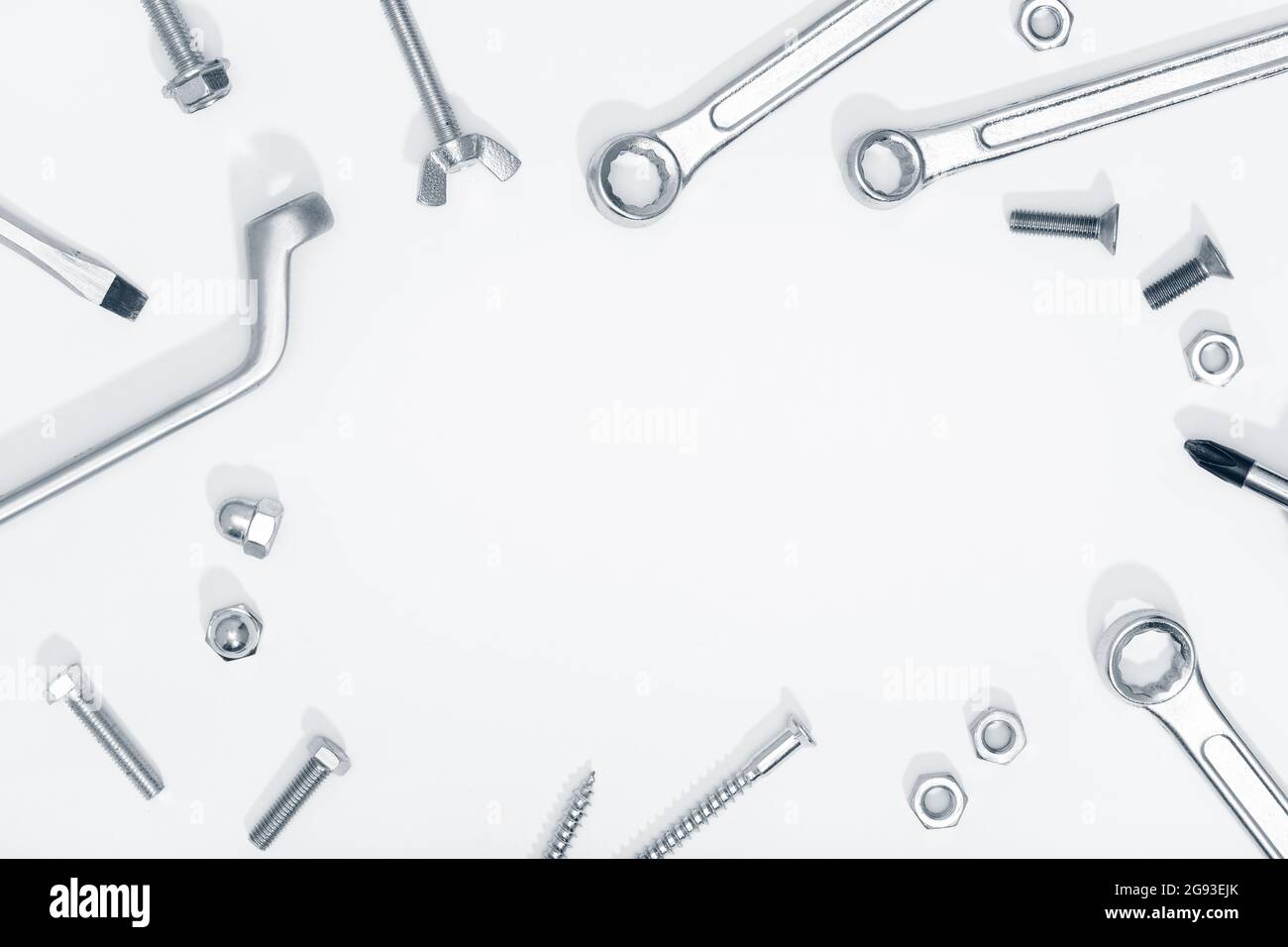 Border frame of Tool, screw and nut on white background. Copy space. Labor day concept Stock Photo