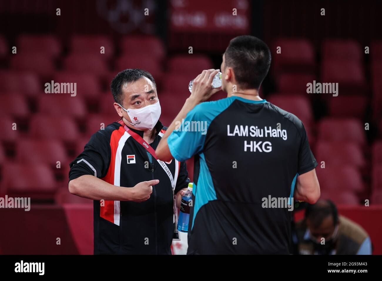 Tokyo, Japan. 24th July, 2021. Liu Guodong (L), coach of China's Hong ...